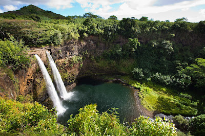 Behold Wailua Falls, a 113-foot waterfall near Lihue on Kauai that feeds into the Wailua River.
