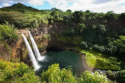 Behold Wailua Falls, a 113-foot waterfall near Lihue on Kauai that feeds into the Wailua River.