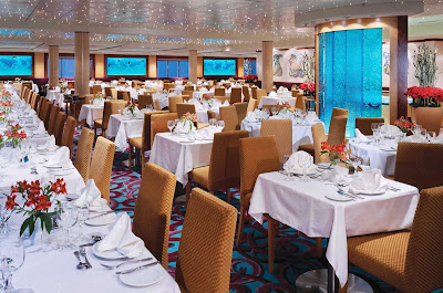 The dimmed lighting of Aqua, one of Norwegian Dawn's main restaurants,  creates a romantic ambience. 