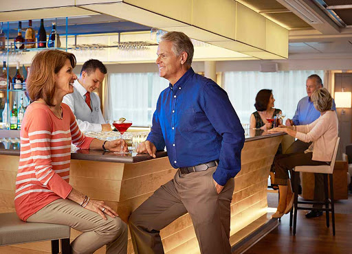 Meet new people and relax with a cocktail in the lounge of your Viking Longship during your European vacation.