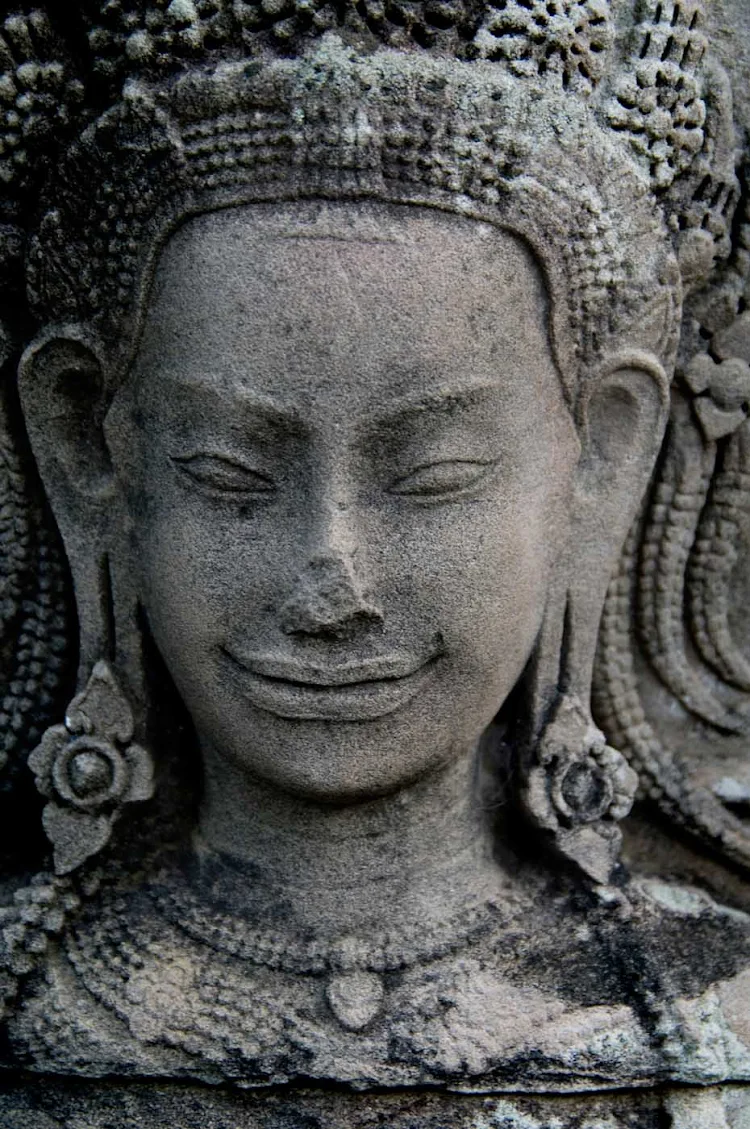 A detail from Bayon Temple, the richly decorated Khmer temple at Angkor in Cambodia built in the late 1100s or early 1200s, seen during a G Adventures expedition to Cambodia.
