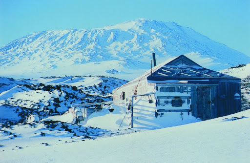 Sir Ernest Shackleton’s Expedition Hut, exterior with Mt. Erebus, 2002