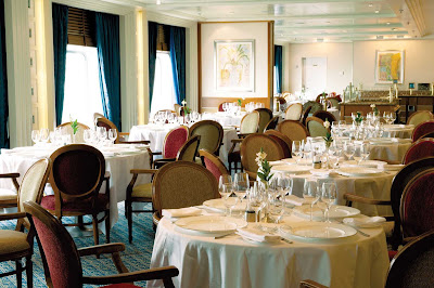 Marble, silver and crystal fixtures combine with romantic candlelight in Silversea’s main restaurant.