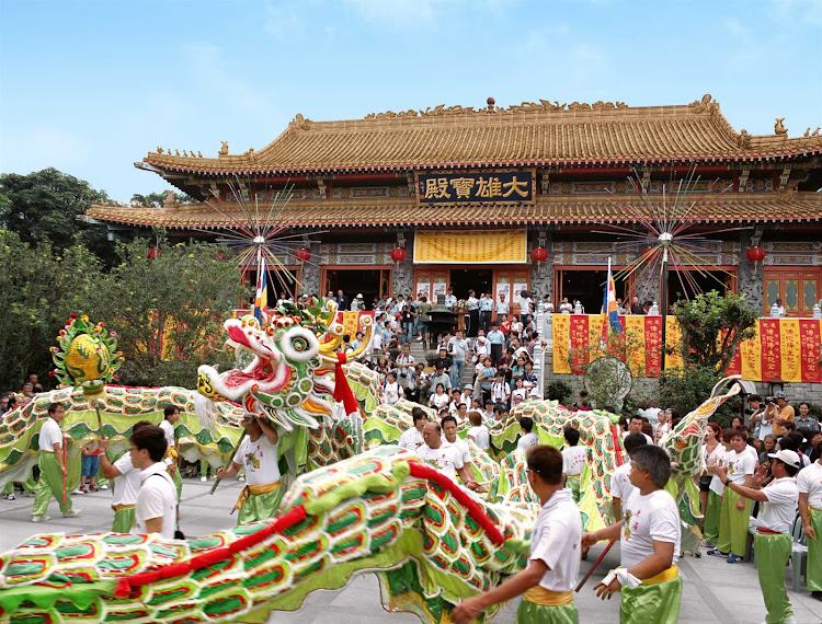 Celebrating the birthday of Buddha at the Po Lin Monastery in Hong Kong.