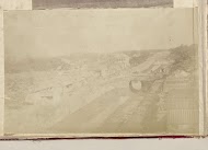 Huizen aan een gracht, mogelijk in Beijing