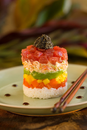 layered-ahi-poke - Layered ahi poke cuisine. Poke (pronounced POH-kay) is served in most Hawaiian restaurants as a side dish or appetizer. In Hawaiian, poke means "cut piece" or "small piece." 