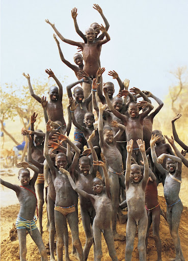 Dinka Children on Termite Mound