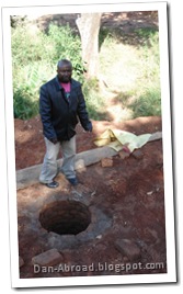 Foster, showing the shallow well he will be building a cement apron for to protect it from contamination.