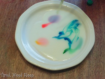 drop of soap breaks surface tension, and the colors explode