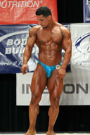 Male Bodybuilders Posing On Stage 3