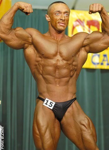 Male Bodybuilder Posing On Stage 9 - Sexy Guys with Sexy Posing Trunks.