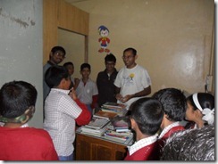 Nikhil and other volunteers with the students
