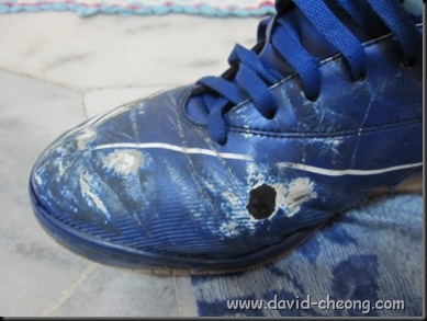 old blue addidas futsal shoe