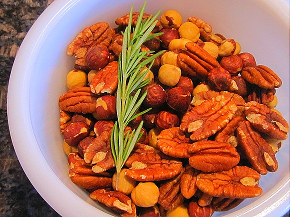 Pecans & hazelnuts, with a sprig of rosemary