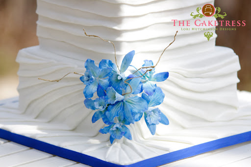 Blue Orchids and White Draped Wedding Cake Three tier Cakes Toronto 