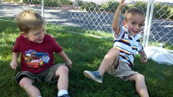 harrison and nate on grass at carnival (1 of 1)