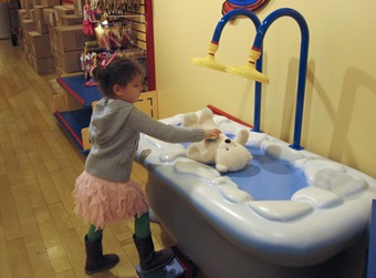 abbie washing her bear (1 of 1)