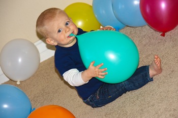 ry eating balloon on bday (1 of 1)