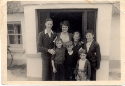On holiday in the country i.e. Cloneygowan, Offaly. Maureen, Ken, Jean behind him and me with some of the neighbours.