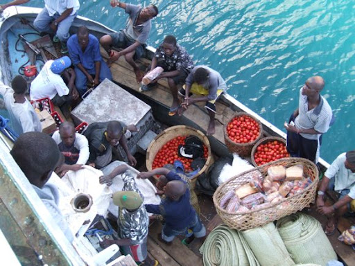 Unloading tomatoes from the Ilala, Lake Malawi's 60-year-old ferry