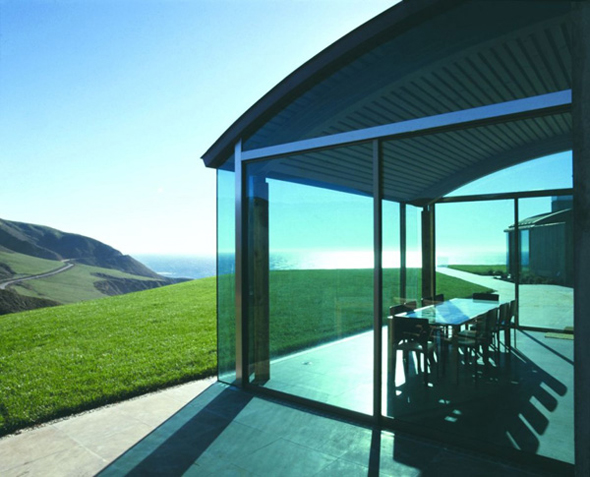 minimalist open concept glass house mountains