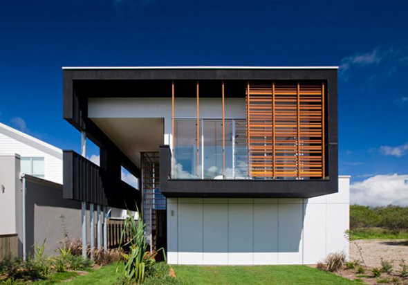 Casual and contemporary Black Cube Beach House Design SheOak by Base Architecture