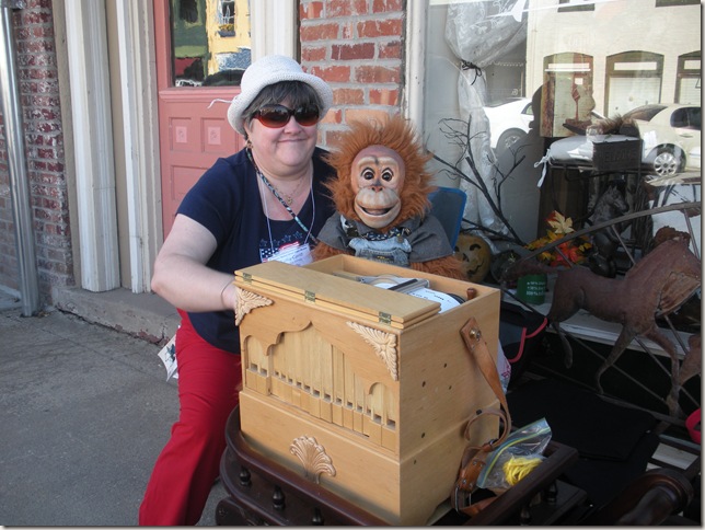 Organ grinder lady with monkey puppet