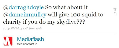 text reads: @darraghdoyle So what about it @dameinmulley will give 100 squid to charity if you do my skydive???