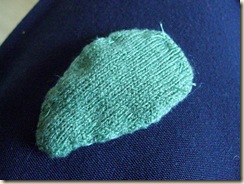 recyled knitwear to back of leaf