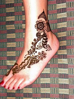 female foot tattoo