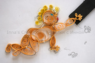 Crawling baby. Quilling
