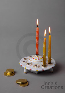 Flying saucer Hanukiah with candles