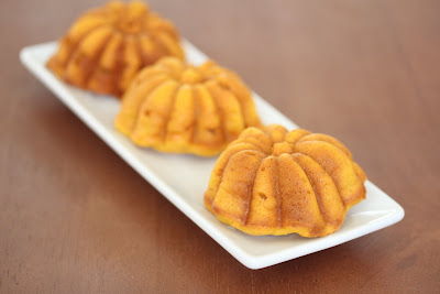 photo of three cakes lined up on a plate