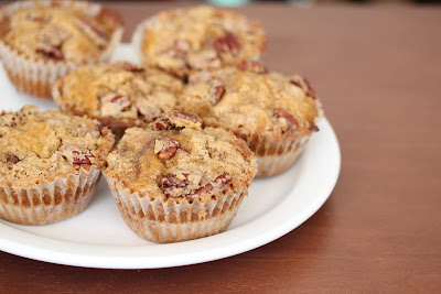 photo of Pecan streusel pumpkin muffins on a plate