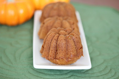 photo of three pumpkin spice cakes lined up on a plate