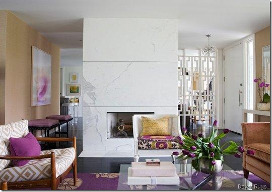 angie-hranowsky-living-room-marble-modern-fireplace-center-purple-accents-accessories-pillow-rug-white-geometric-screen dover rugs