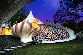 http://www.boredpanda.com/top-33-worlds-strangest-buildings/