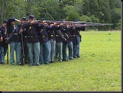 Re-enactors demonstrate firing from 2-line formation