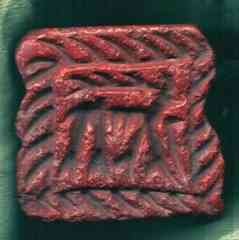 This red stone seal with an image of a deer is 2 inches by 2.5 inches. The stone is not native to the area, but the seal is similar to one found 185 miles to the east near Mosul in northern Iraq. (Gil Stein/Oriental Institute, University of Chicago) 