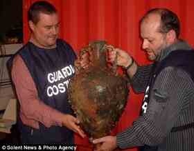One of the Roman pots that were found lying on the sea bed off the coast of Italy by a British research team. Experts believe they held oils