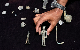 Recently excavated artifacts are shown onboard the Princess Duda research boat, anchored in the harbor of Alexandria