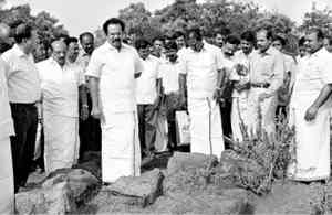 Minister for Education Thangam Thennarasu (fourth from left) inspecting the stone idols at Rajakkamangalam near Valliyoor on Thursday