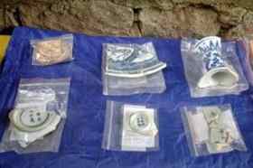 iSome of the artifacts having been dug out underneath Rua de D. Belchior Carneiro