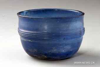 A color-glazed cup made in ancient China's Han Dynasty (206 BC-220 AD) and excavated at Caoxie Village in Lianzhou Town of Hepu County, southwest China's Guangxi Zhuang Autonomous Region