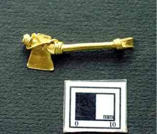 A 1.89 gm golden felling axe with a loop at the tip of the handle, giving the impression that it could have been an ornament, found at Pattanam. 