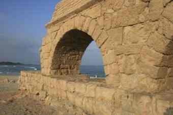 Part of an ancient aqueduct at Caesarea, Israel, a site of many antiquity excavations.