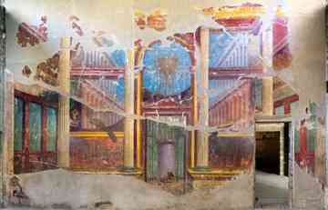 Room 15 of Villa Oplontis is a good example of the wall paintings found in the Villa A Oplontis, an elegant Roman villa buried in 79 A.D. in the eruption of Vesuvius. Historians are not sure who owned the villa, which is considered the most extravagant excavated villa on the Bay of Naples and the site of some of the best examples of Second Style Roman paintings. Popular thought is that the 96-room villa may have belonged to Pomppaea Sabina, second wife of Nero Caesar, and a native of the area. 