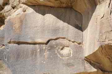 This petroglyph in Nine Mile Canyon, Utah, was cut and shot.