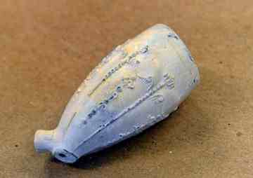 Many clay tobacco pipes from the Netherlands were found at the site. This one bears the mark of Dutch pipemaker Willem Schippers. (The News Journal/GARY EMEIGH)