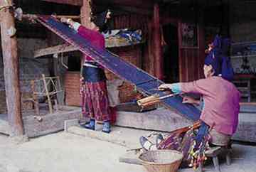Weavers of Achang Nationality in Yunnan Province. 